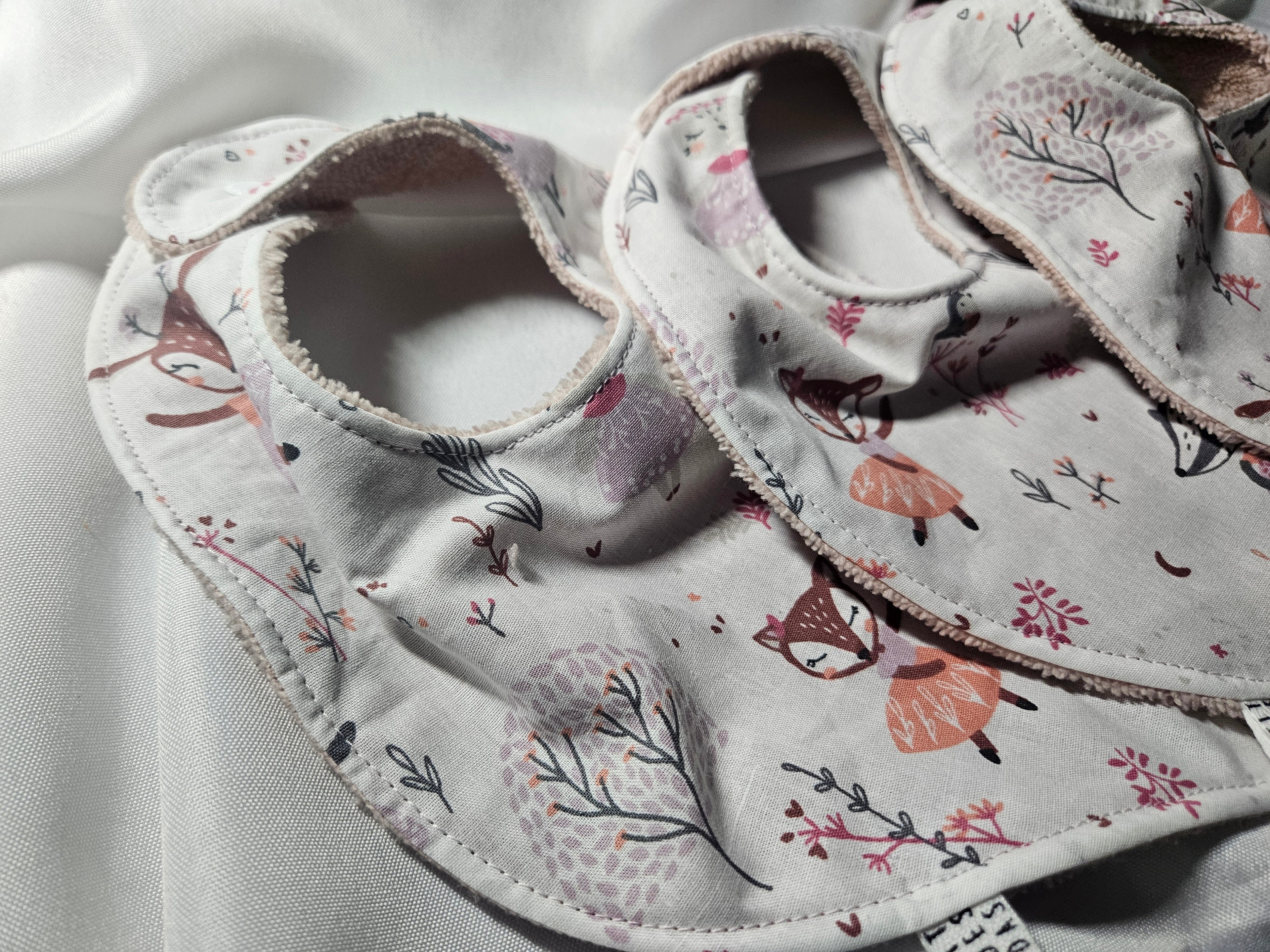 Bavoir danseuses rose